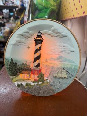Hand-Painted Lighthouse Wall Art with Soft Amber Light